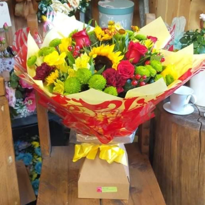 Autumnal splendour - Warm and inviting autumnal shades a selection of flowers handtied in water